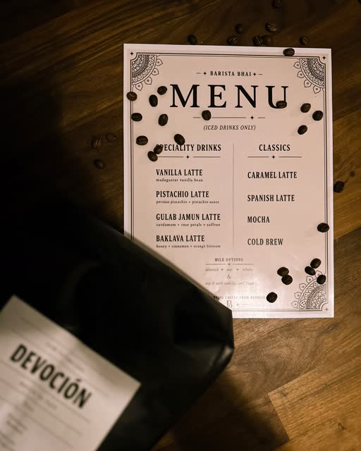 The printed Barista Bhai menu with coffee beans